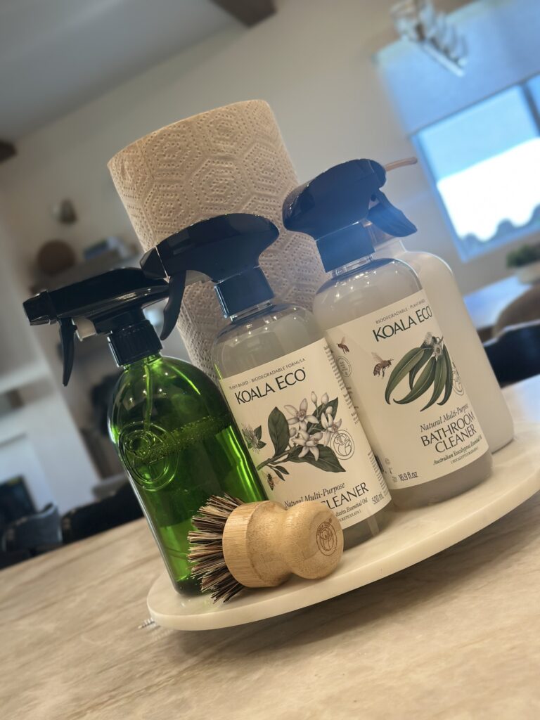 Koala Eco plant-based natural multi-purpose cleaner and bathroom cleaner on a lazy susan left by Aussie Got It after a Las Vegas house cleaning service
